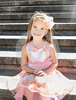 Outdoor portrait of cute little girl