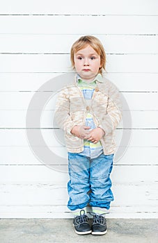 Outdoor portrait of a cute toddler boy