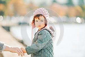 Outdoor portrait of cute toddler girl
