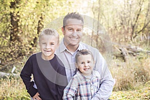 Outdoor Portrait of a Father with his two sons