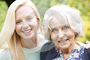 Outdoor Portrait Of Grandmother And Granddaughter