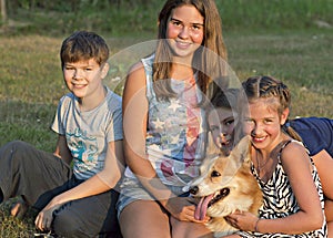 Outdoor portrait of group of teenagers with the do