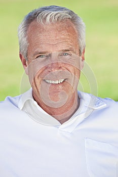 Outdoor Portrait of A Happy Handsome Senior Man