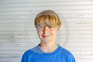 Outdoor portrait of happy smiling boy