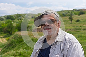 Outdoor portrait of happy Ukrainian countryman