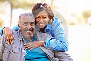 Outdoor Portrait Of Loving Senior Couple