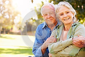 Outdoor Portrait Of Loving Senior Couple