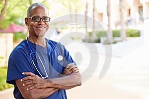 Outdoor Portrait Of Male Nurse photo