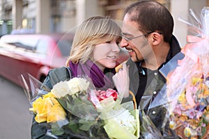 Outdoor portrait of man in glasses and beauty girl