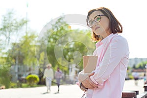 Outdoor portrait middle aged woman