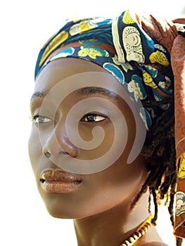 Outdoor portrait of pretty black woman head scarf