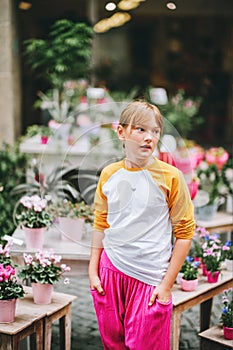 Outdoor portrait of pretty little teenage girl