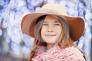 Outdoor portrait of pretty young kid girl
