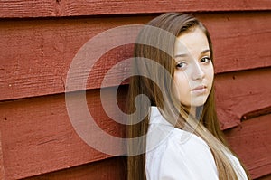 Outdoor portrait of pretty, young teen girl