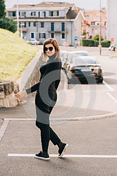 Outdoor portrait of pretty young woman