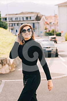 Outdoor portrait of pretty young woman