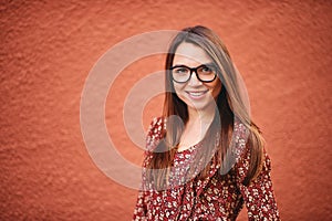 Outdoor portrait of pretty young woman