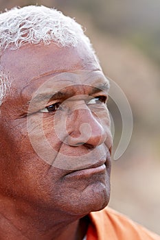 Outdoor Portrait Of Serious African American Senior Man With Mental Health Concerns