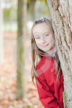 Outdoor portrait of a smiling girl