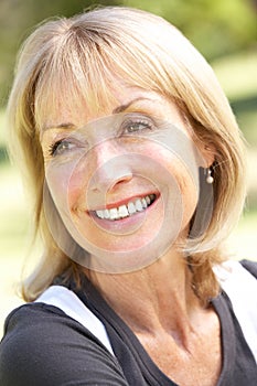 Outdoor Portrait Of Smiling Senior Woman