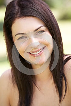 Outdoor Portrait Of Smiling Woman