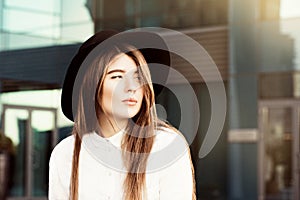 Outdoor portrait of a thoughtful teenage girl