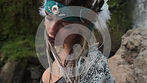 Outdoor portrait of a woman in tribal style
