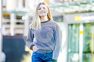 Outdoor portrait of young happy smiling teen girl, natural outdo