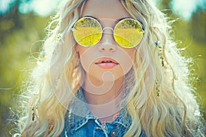 Outdoor portrait of young hippie woman