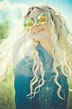 Outdoor portrait of young hippie woman