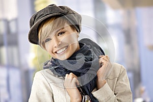 Outdoor portrait of young woman in winter clothes