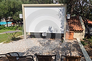 Outdoor projector screen homemade cinema seminar hotel with seats blank