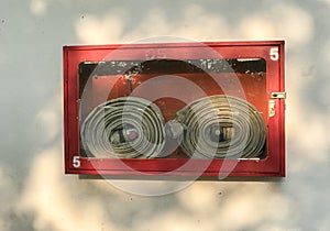 Outdoor red fire hose cabinet