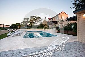 Outdoor is relaxing area with a swimming pool