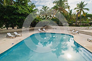 Outdoor resort pool Swimming pool of luxury hotel. Swimming pool in luxury resort near the sea. Tropical Paradise. Swimming pool