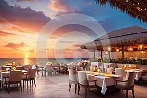 Outdoor restaurant at the beach. Table setting at tropical beach restaurant. beautiful sunset sky, sea view. Luxury