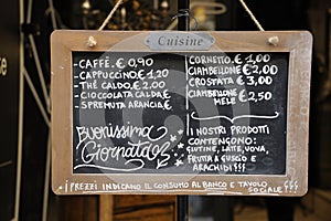 Outdoor restaurant menu sign in Italian photo