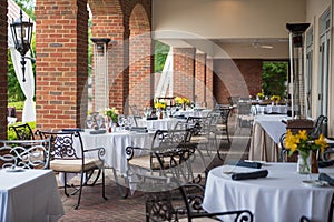 Outdoor restaurant with tables set for a wedding celebration in Marietta, Georgia, the US