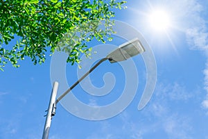 Outdoor road lamp on sunny day blue sky