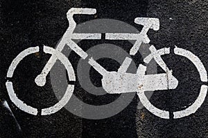 Outdoor road sign indicating dedicated route for bicycles in a large city