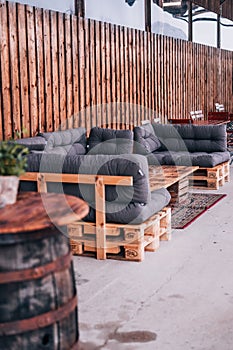 Outdoor seating area situated outside of a bar