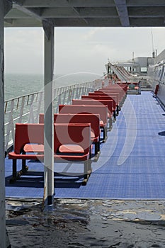 Outdoor seating on a ferry or ship