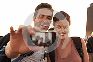 Outdoor, selfie or happy couple hiking for travel for vacation memory, holiday or sightseeing in city. Photo, people and