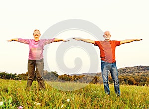 outdoor senior fitness woman man lifestyle active sport exercise healthy fit retirement stretching elderly couple