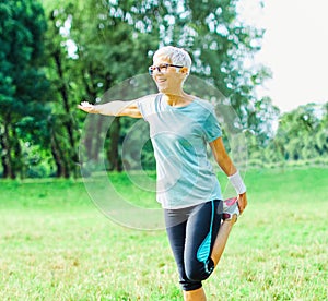 outdoor senior fitness woman man lifestyle active sport exercise healthy fit retirement stretching elderly couple