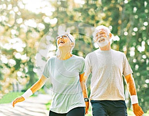 outdoor senior fitness woman man lifestyle active sport exercise healthy fit runner couple running jogging elderly