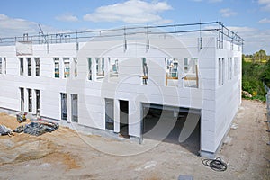 outdoor shot of a building that is in the process of completion on a construction site