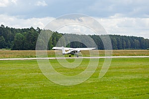Outdoor shot of small plane taking off
