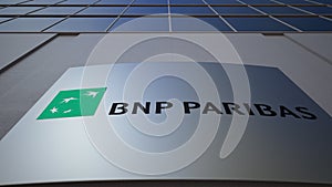 Outdoor signage board with BNP Paribas logo. Modern office building. Editorial 3D rendering