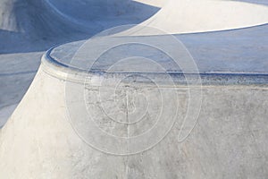 Skate park generic concrete ramps focus on ramp edge photo